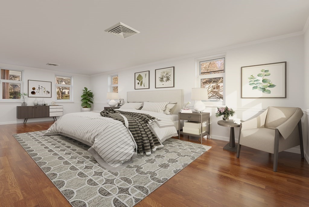 1140 Webster Street Needham, MA 02492 - Photo 16 of 27 a bedroom with a large bed and a couch