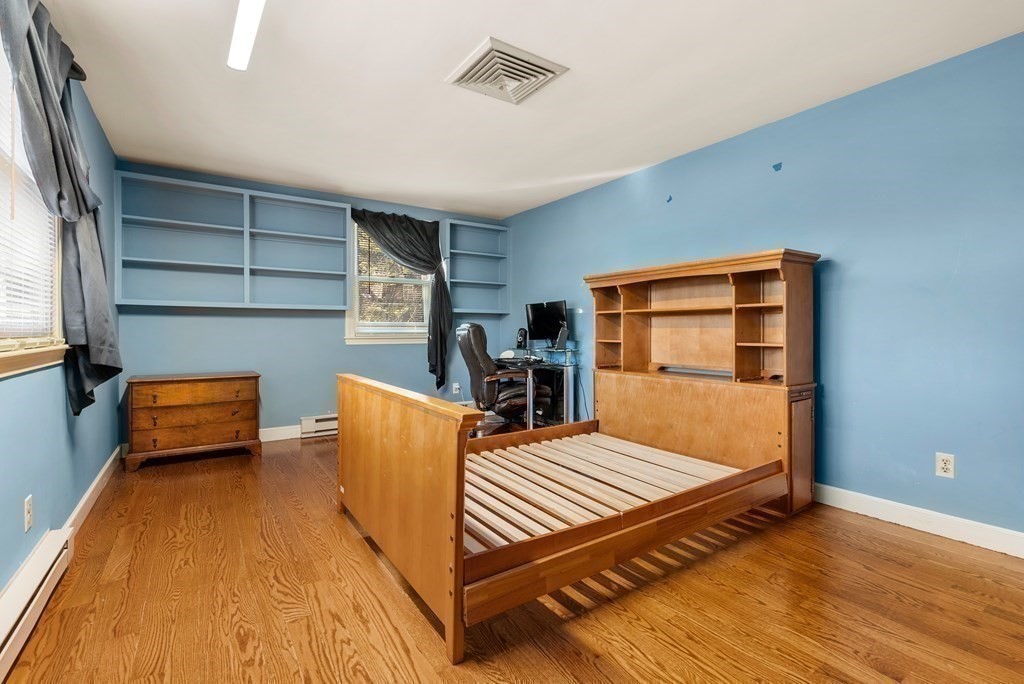 1140 Webster Street Needham, MA 02492 - Photo 18 of 27 a bedroom with furniture and a window