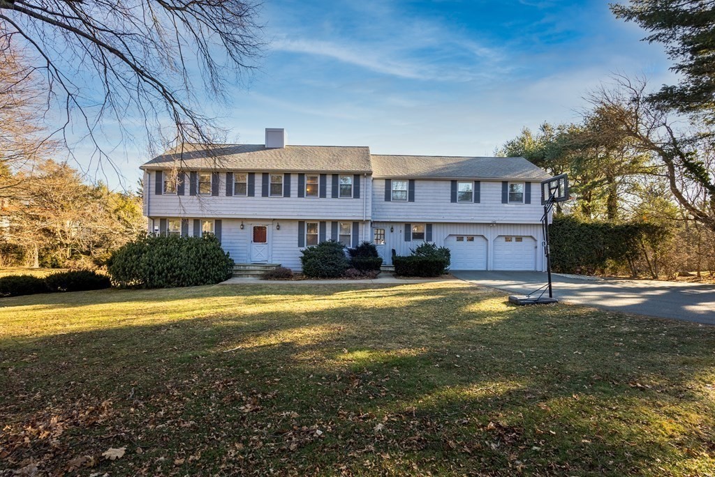1140 Webster Street Needham, MA 02492 - Photo 2 of 27 a front view of a house with a yard