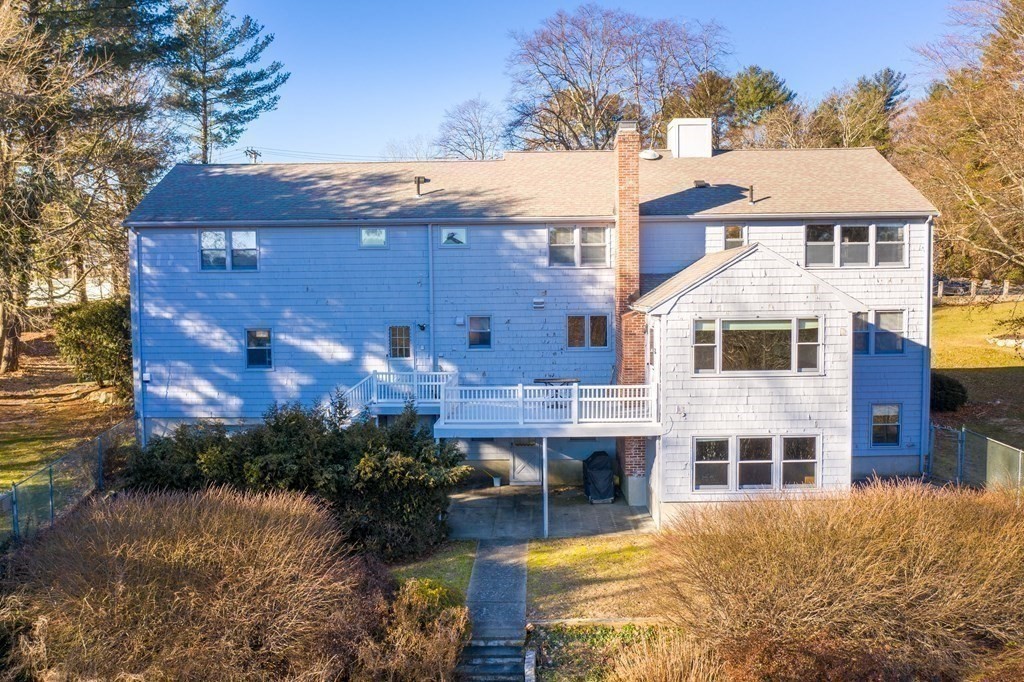 1140 Webster Street Needham, MA 02492 - Photo 25 of 27 a view of a building with a yard
