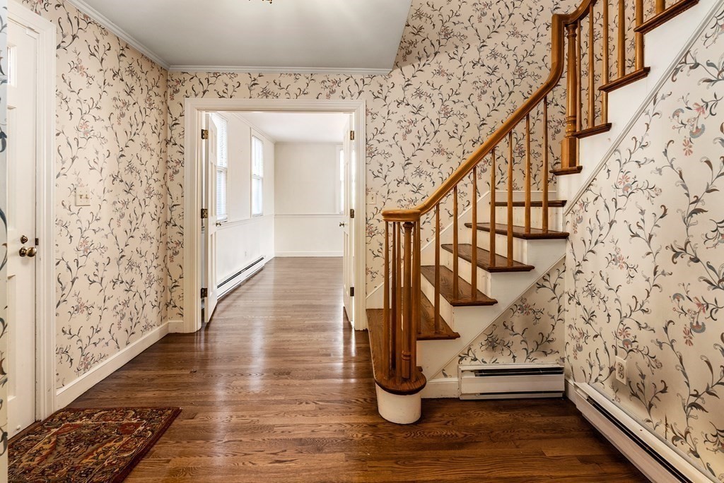 1140 Webster Street Needham, MA 02492 - Photo 5 of 27 a view of entryway with wooden floor