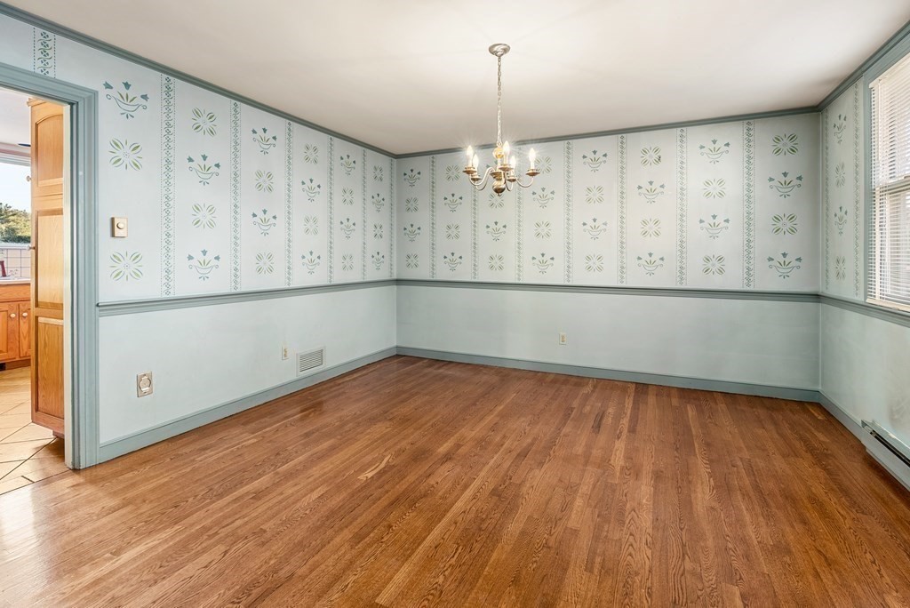 1140 Webster Street Needham, MA 02492 - Photo 6 of 27 an empty room with wooden floor