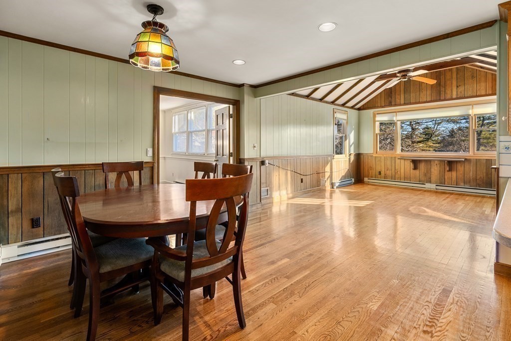 1140 Webster Street Needham, MA 02492 - Photo 9 of 27 a view of a dining room with furniture and a chandelier