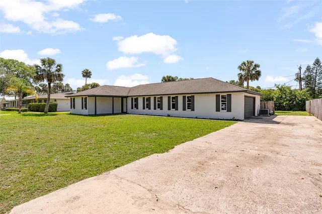 a view of a house with a swimming pool