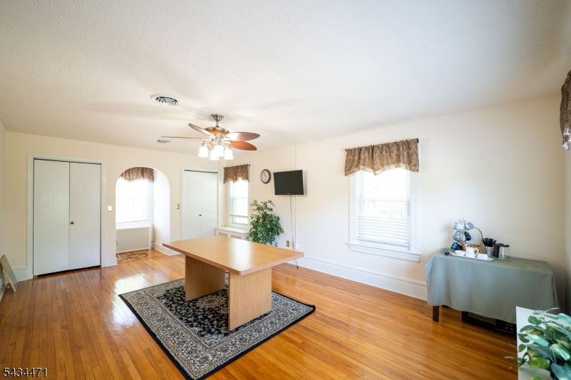 192 Lincoln Road Phillipsburg, NJ 08865 - Photo 37 of 50 a living room with furniture and a wooden floor