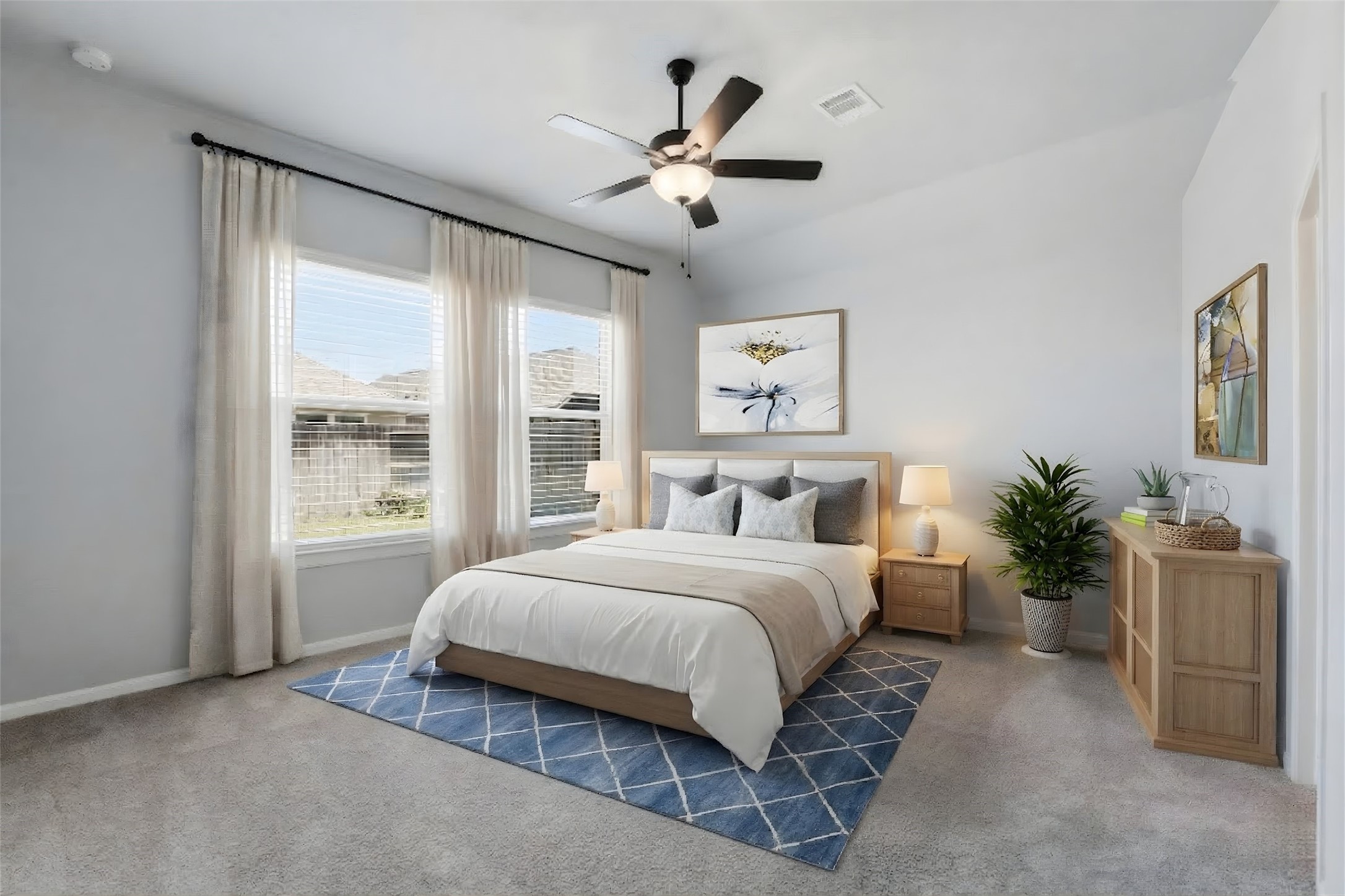 1338 Lakeside Crk Road Magnolia, TX 77354 - Photo 19 of 37 a bedroom with a large bed and a large window