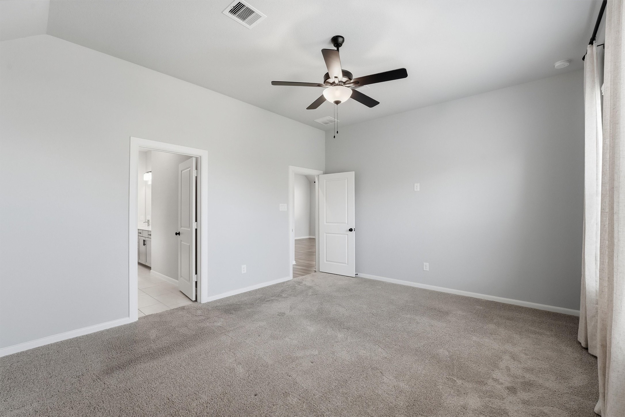 1338 Lakeside Crk Road Magnolia, TX 77354 - Photo 21 of 37 a view of an empty room and chandelier fan