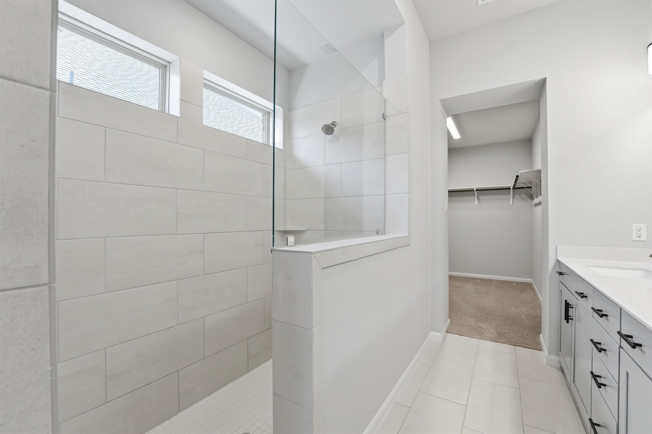 1338 Lakeside Crk Road Magnolia, TX 77354 - Photo 23 of 37 a bathroom with a bathtub and a shower