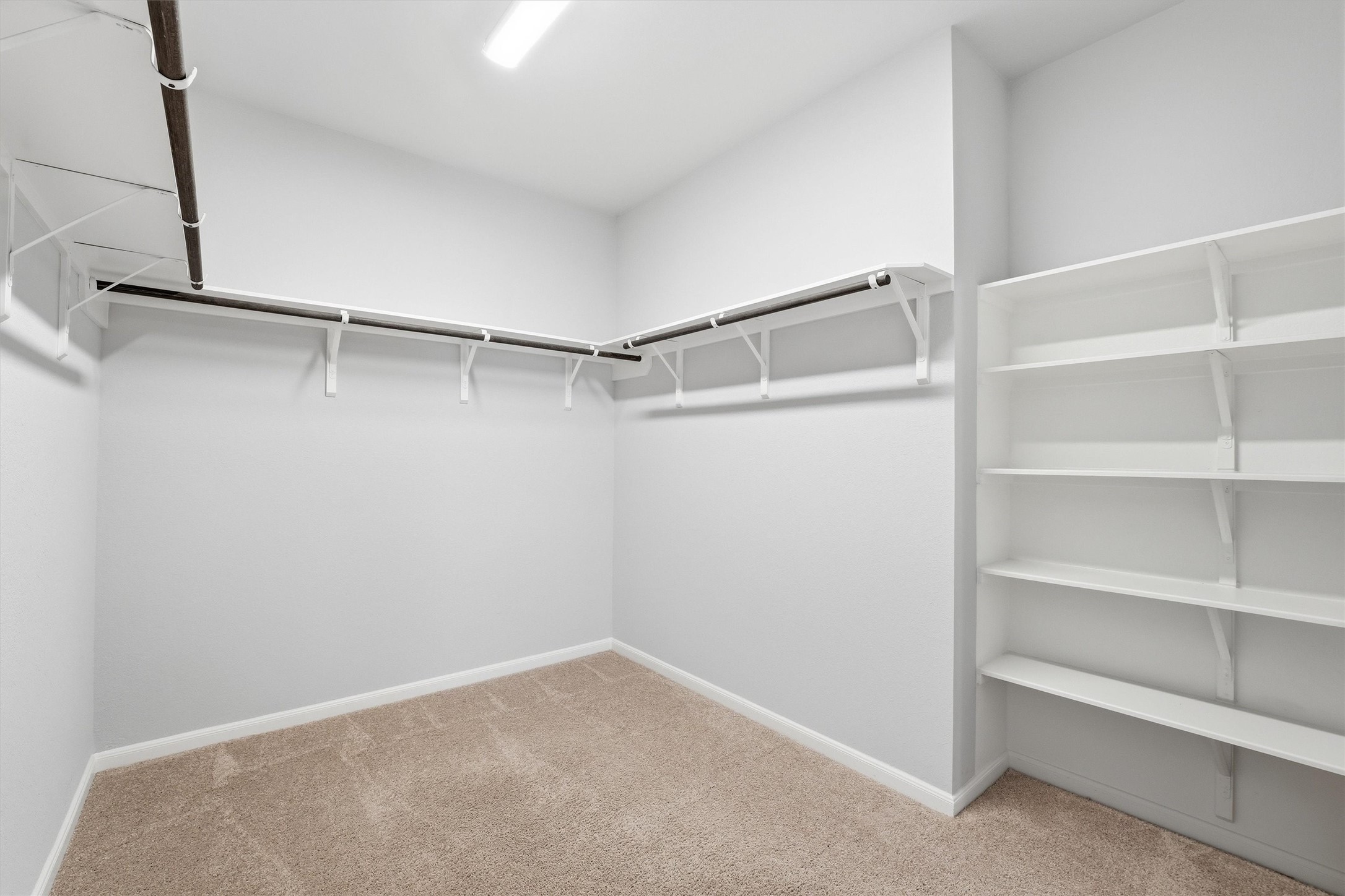 1338 Lakeside Crk Road Magnolia, TX 77354 - Photo 24 of 37 a view of an empty walk in closet