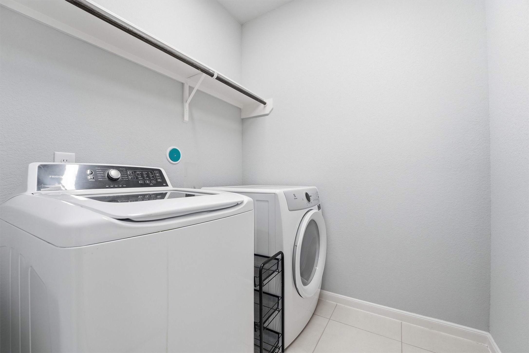 1338 Lakeside Crk Road Magnolia, TX 77354 - Photo 25 of 37 a utility room with dryer and washer
