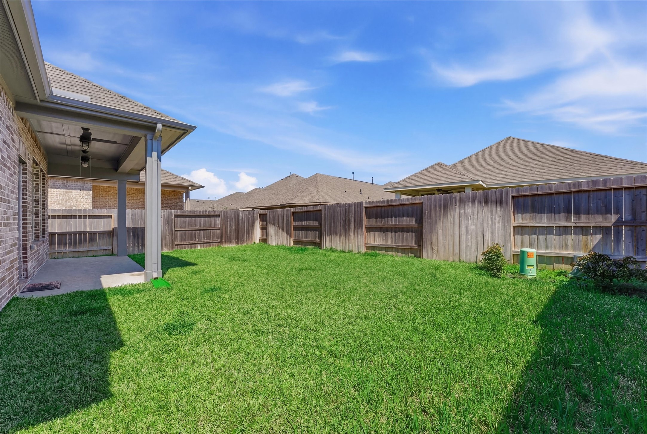 1338 Lakeside Crk Road Magnolia, TX 77354 - Photo 27 of 37 a front view of a house with a yard