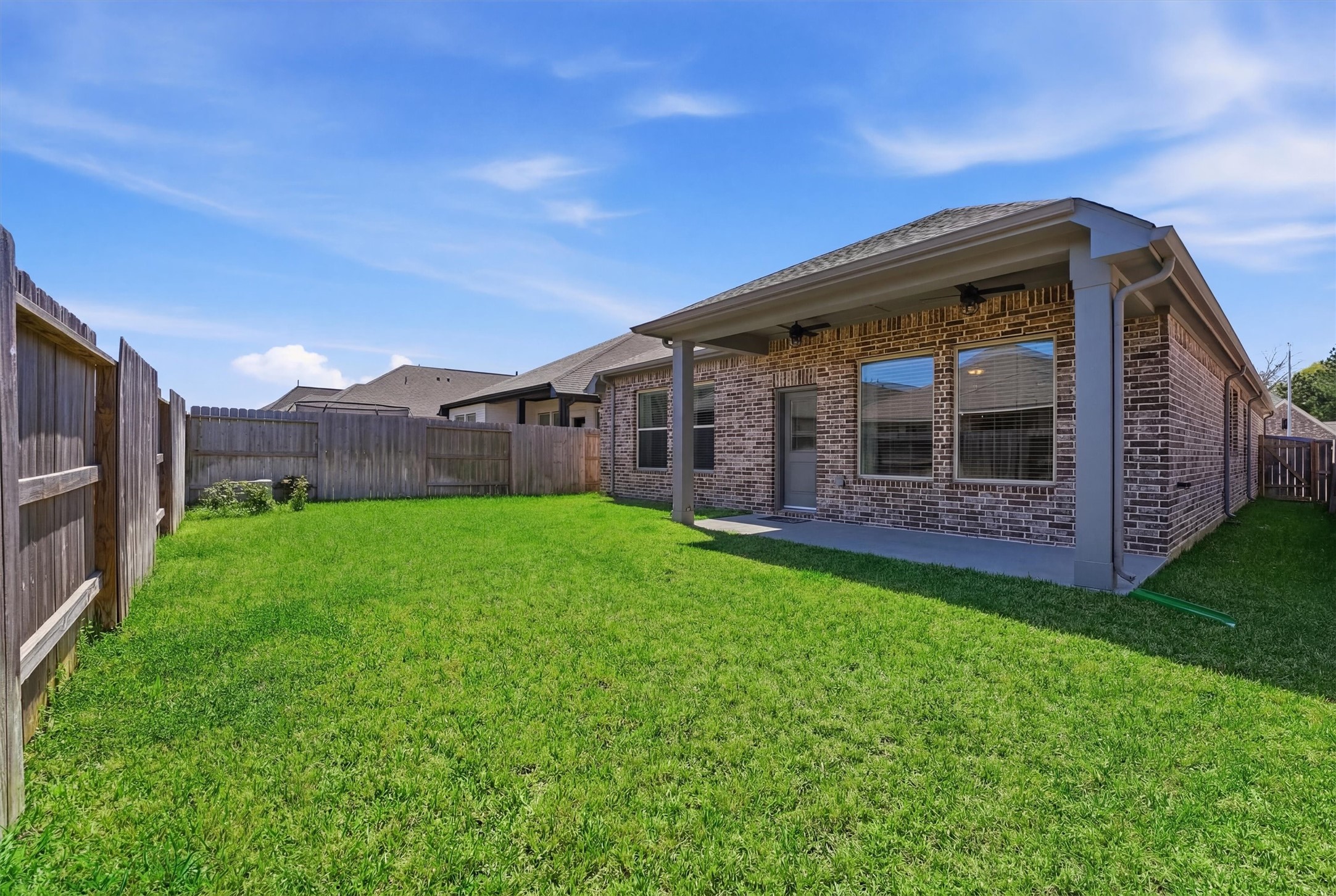 1338 Lakeside Crk Road Magnolia, TX 77354 - Photo 28 of 37 a view of a house with backyard and porch
