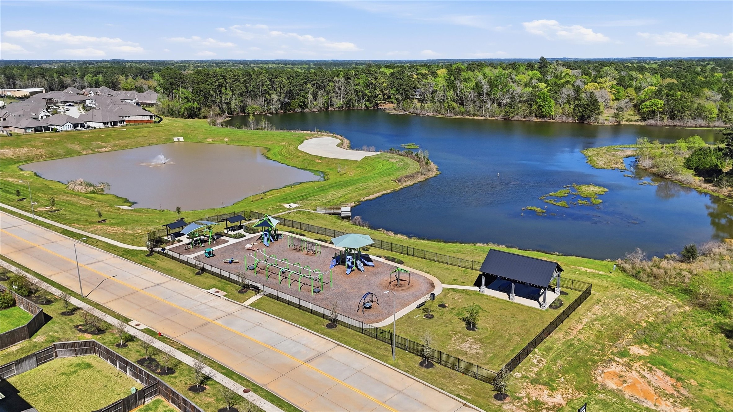 1338 Lakeside Crk Road Magnolia, TX 77354 - Photo 36 of 37 an aerial view of a house with a ocean view