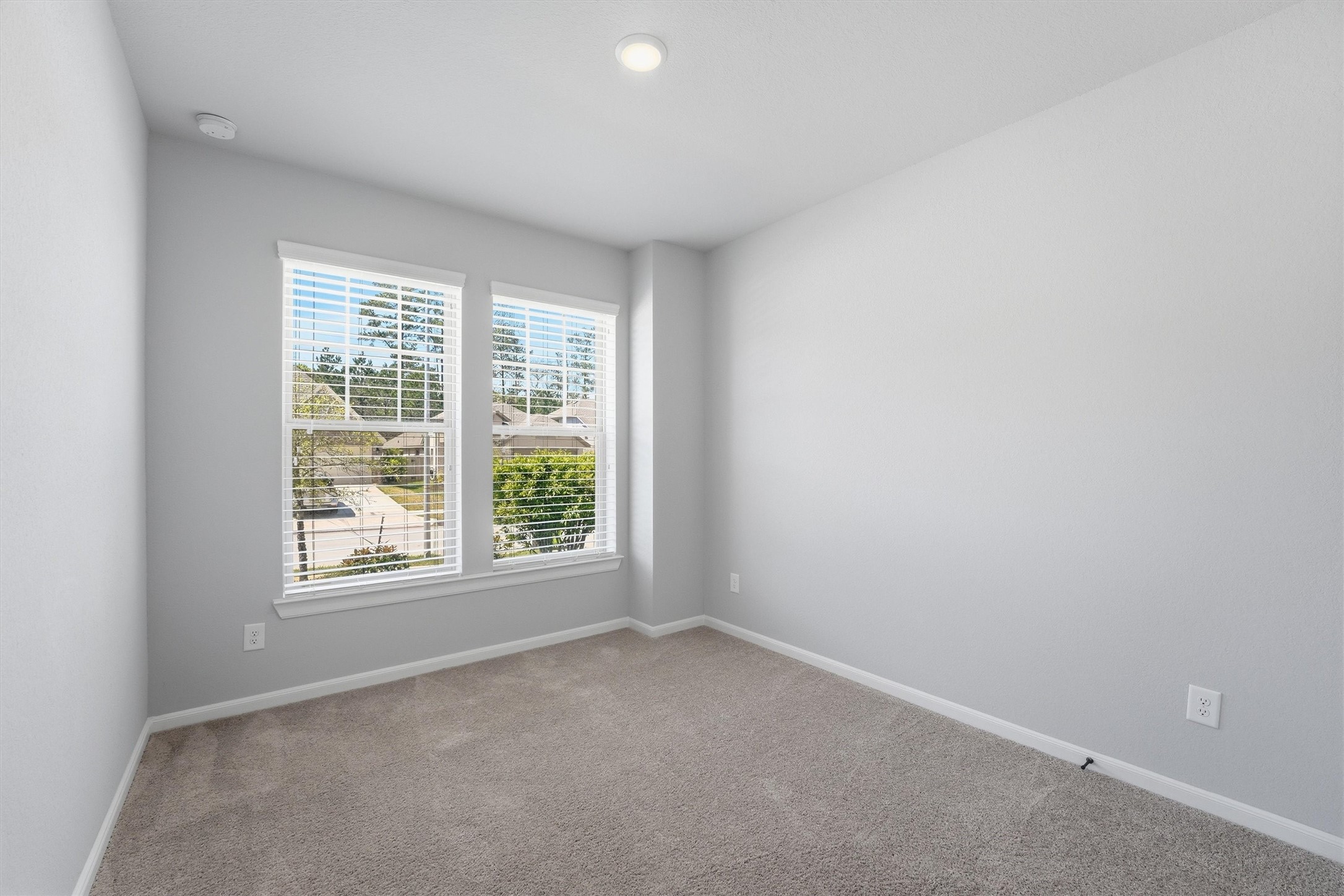 1338 Lakeside Crk Road Magnolia, TX 77354 - Photo 7 of 37 an empty room with a window
