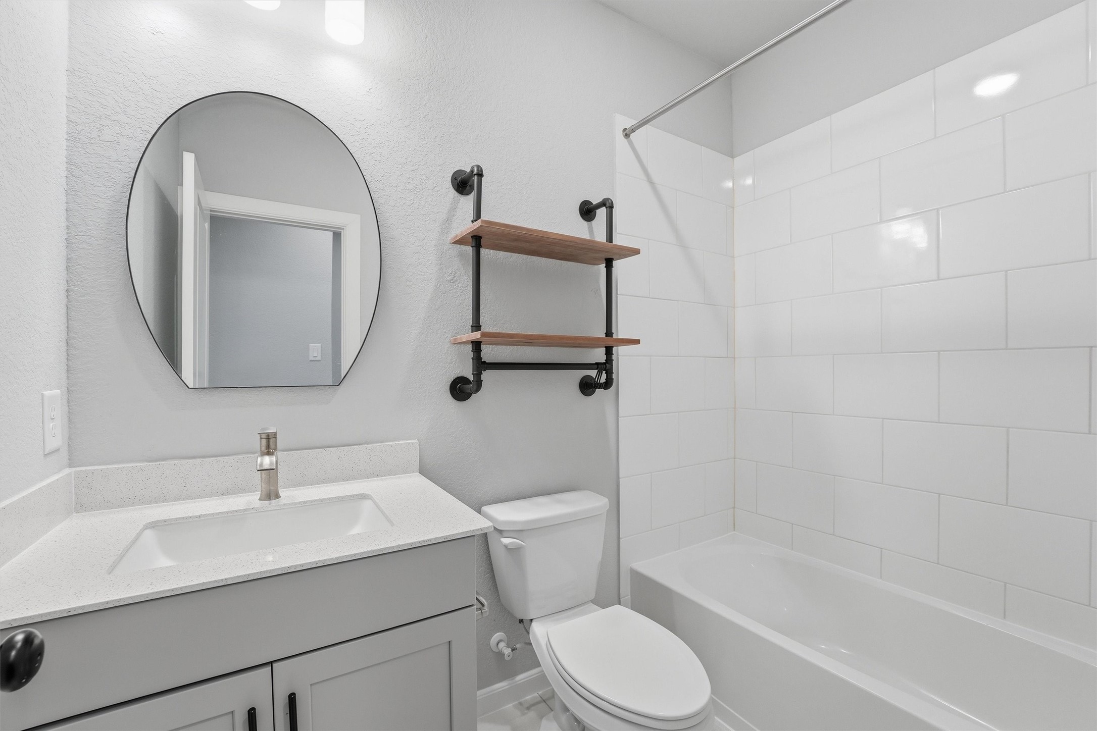 1338 Lakeside Crk Road Magnolia, TX 77354 - Photo 8 of 37 a bathroom with a sink toilet and shower