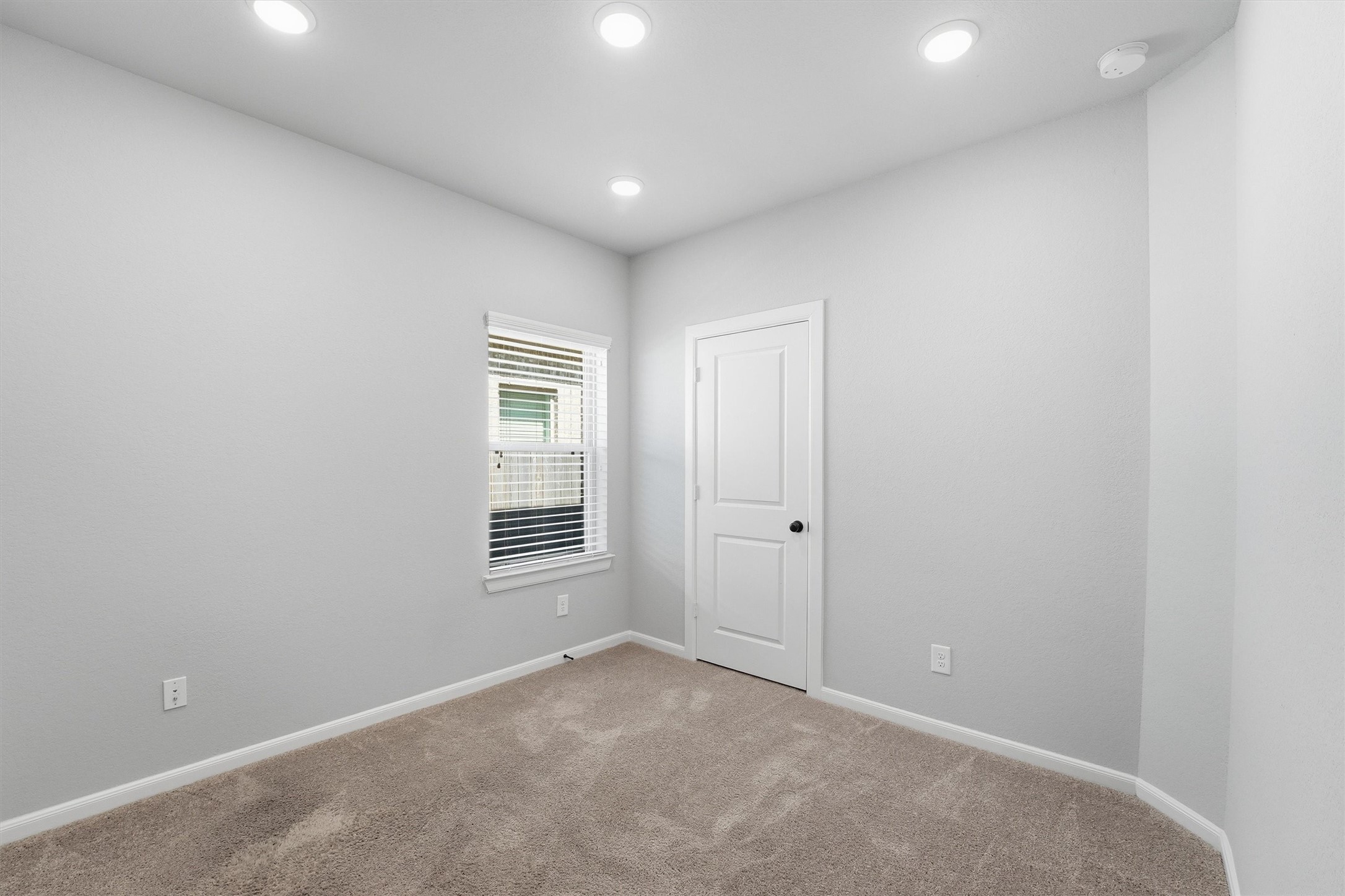 1338 Lakeside Crk Road Magnolia, TX 77354 - Photo 9 of 37 a view of an empty room with a window
