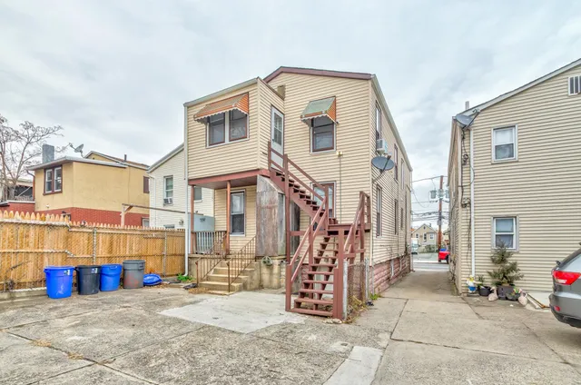a front view of a house with a porch