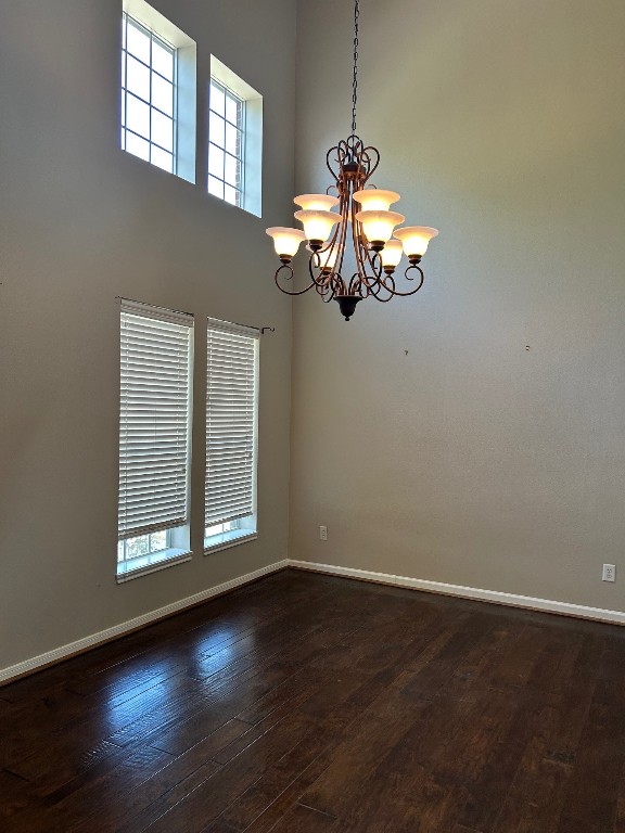 25402 China Springs Spring, TX 77373 - Photo 3 of 11 an empty room with wooden floor chandelier and windows