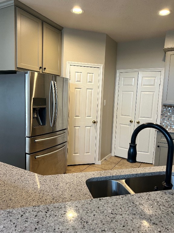 25402 China Springs Spring, TX 77373 - Photo 7 of 11 a kitchen with a refrigerator and a sink