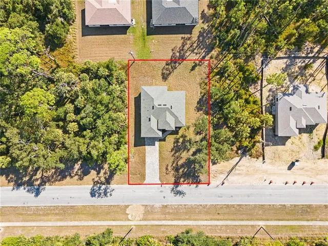 front view of a house with a ocean view