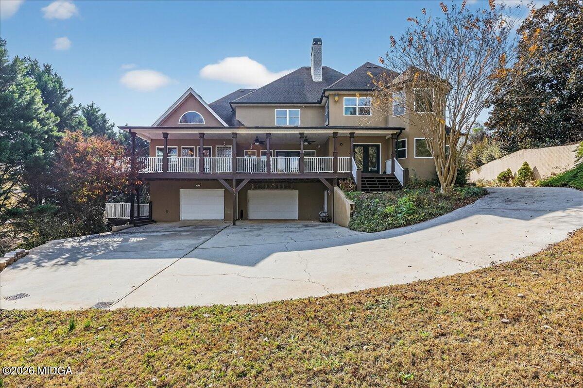518 River Overlook Forsyth, GA 31029 - Photo 68 of 96 a front view of a house with a yard