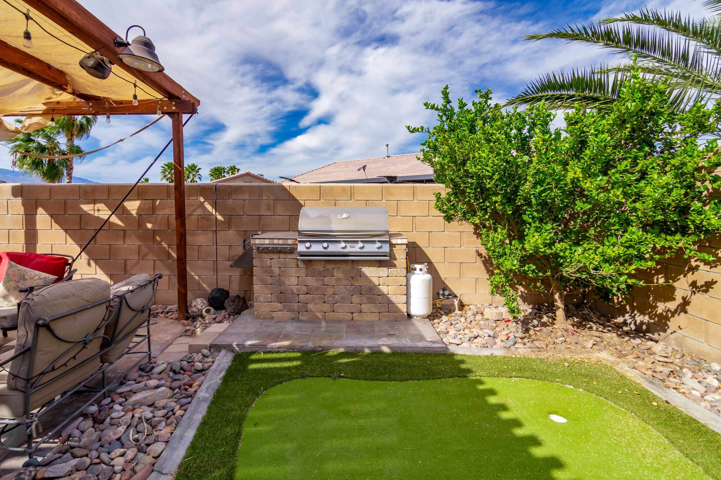 40681 Morris Street Indio, CA 92203 - Photo 7 of 36 a view of a backyard with plants