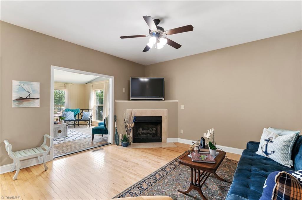 2188 Riverview Rd Extension Lexington, NC 27292 - Photo 11 of 29 Main level hardwoods! Separate living room area with Gas fireplace, YEAR round enjoyment!