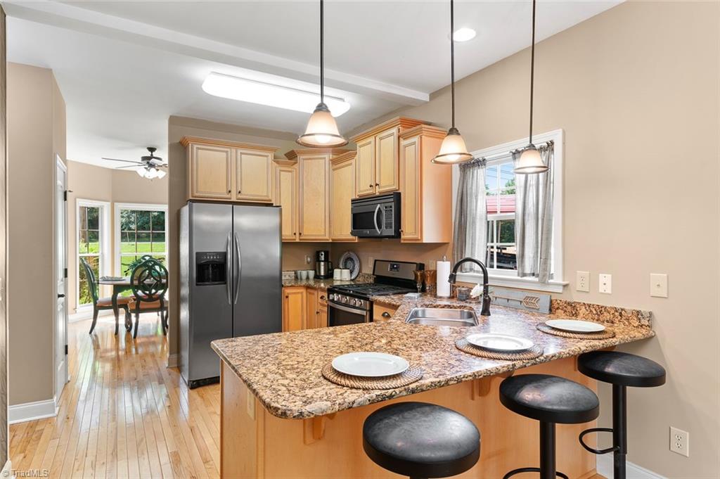 2188 Riverview Rd Extension Lexington, NC 27292 - Photo 14 of 29 Lovely Kitchen with SS appliances, Gas range and eat in Bar area