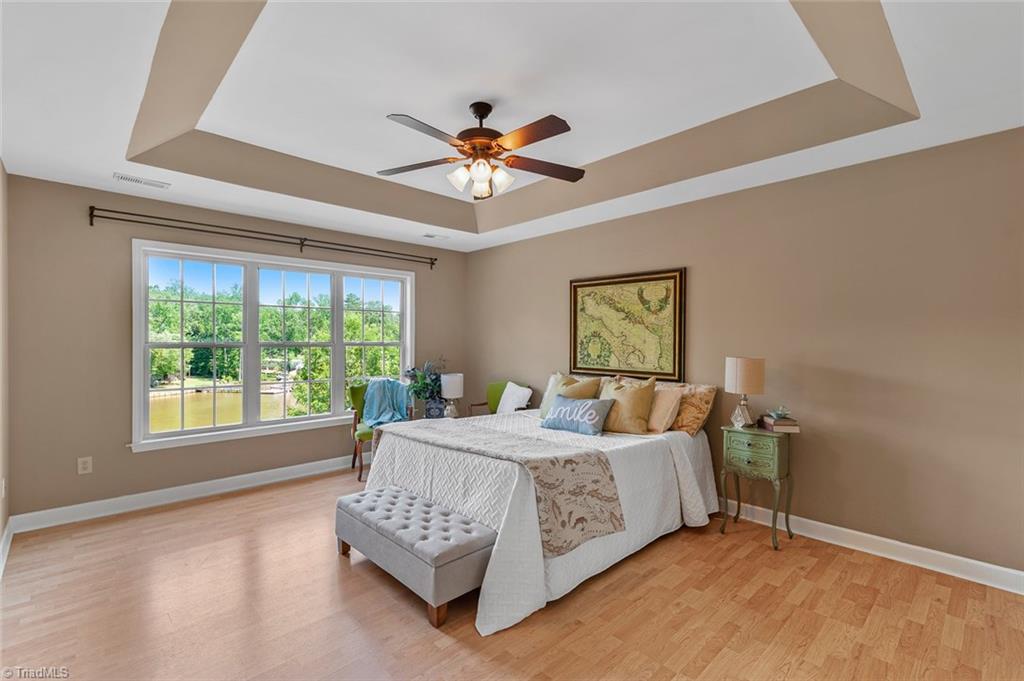 2188 Riverview Rd Extension Lexington, NC 27292 - Photo 15 of 29 Breathtaking views from the SPACIOUS Master Bedroom, HUGE walk in closet, easy to maintain laminate floors!