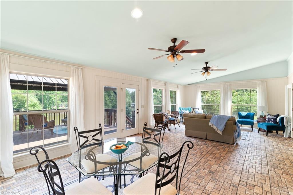 2188 Riverview Rd Extension Lexington, NC 27292 - Photo 9 of 29 Dining, living, and gaming area is how this family uses all this space!