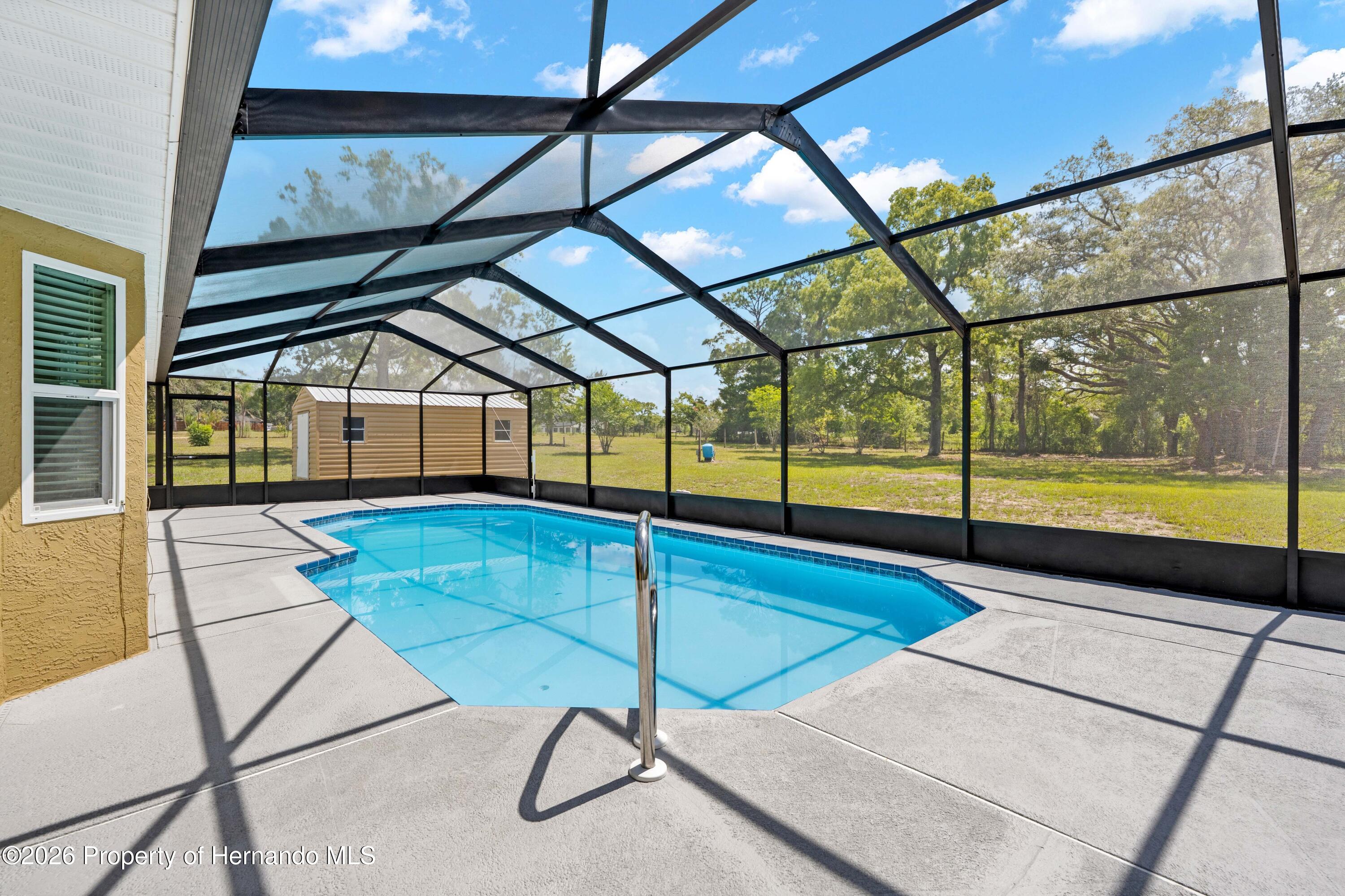 9086 Grove Road Spring Hill, FL 34613 - Photo 5 of 32