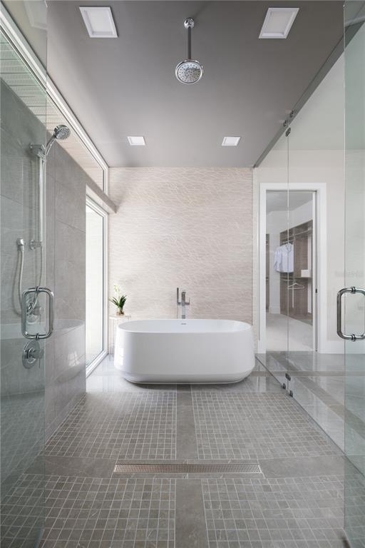 3120 Southwest 108 Way Gainesville, FL 32608 - Photo 15 of 29 a spacious bathroom with a large tub and shower