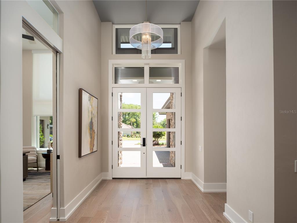 3120 Southwest 108 Way Gainesville, FL 32608 - Photo 2 of 29 a view of a small space with wooden floor and a window
