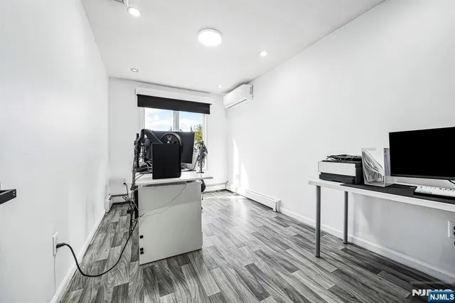 a view of backyard with sitting area