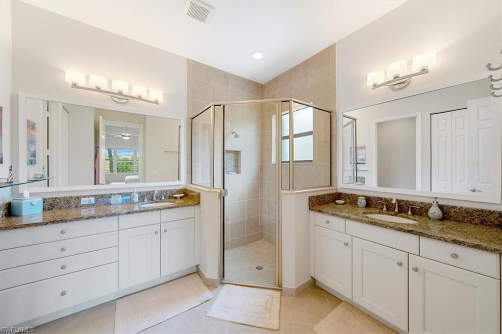 13479 Sumter Lane Naples, FL 34109 - Photo 17 of 35 a bathroom with a granite countertop sink mirror and double