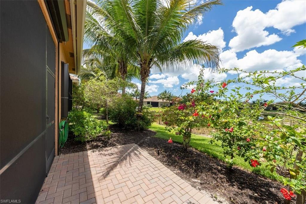 13479 Sumter Lane Naples, FL 34109 - Photo 26 of 35 a view of a garden with a flower garden