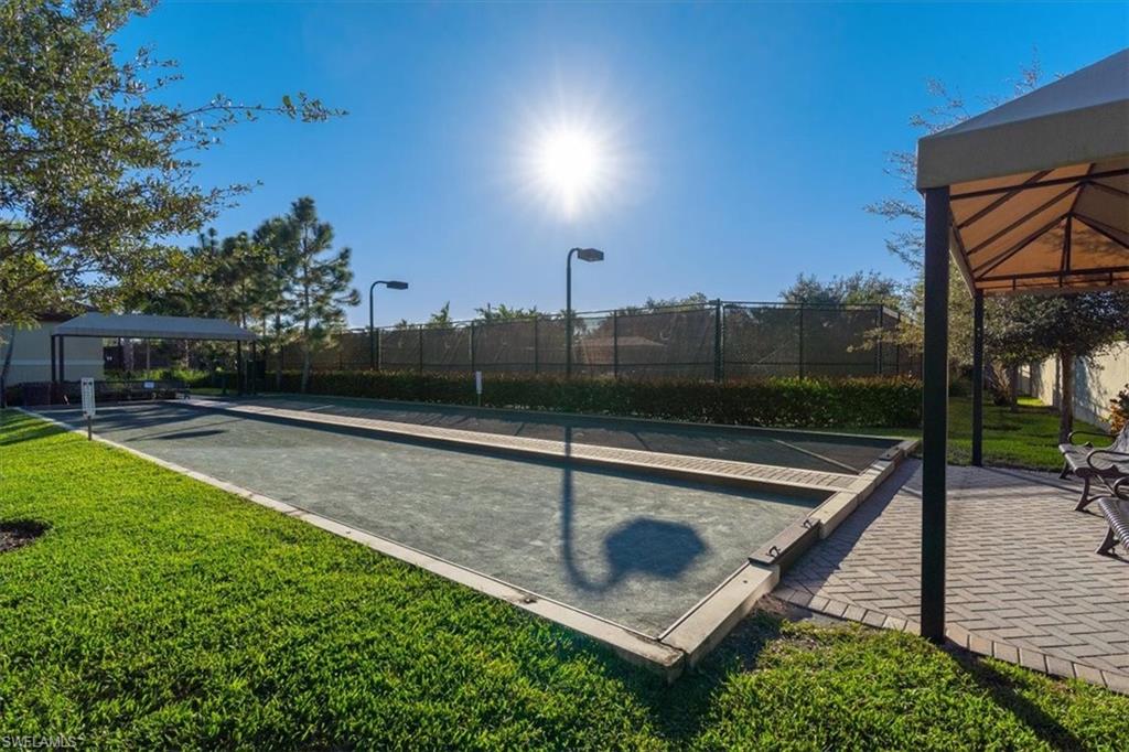 13479 Sumter Lane Naples, FL 34109 - Photo 35 of 35 a view of a backyard with sitting area