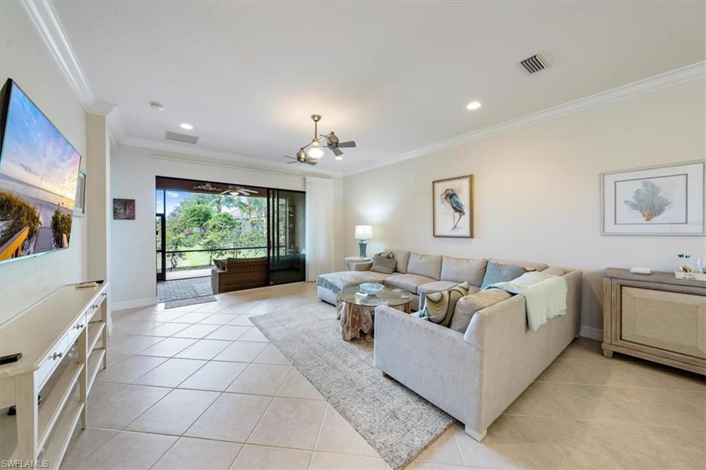13479 Sumter Lane Naples, FL 34109 - Photo 5 of 35 a living room with furniture and a large window