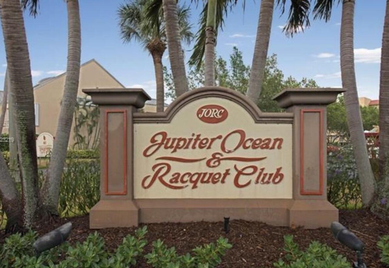 1605 Highway 1, Unit M2202 Jupiter, FL 33477 - Photo 19 of 19 a sign on the side of a building