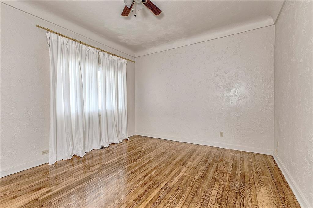 147 South Quarry Street Mount Pleasant, PA 15666 - Photo 12 of 30 wooden floor in an empty room