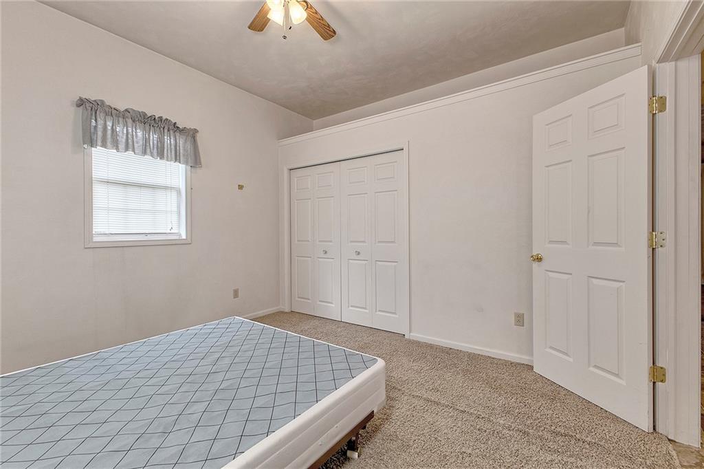 147 South Quarry Street Mount Pleasant, PA 15666 - Photo 22 of 30 a room that has a bed and a window in it