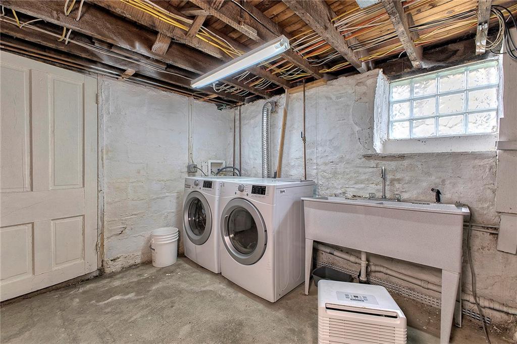 147 South Quarry Street Mount Pleasant, PA 15666 - Photo 26 of 30 a utility room with dryer and washer