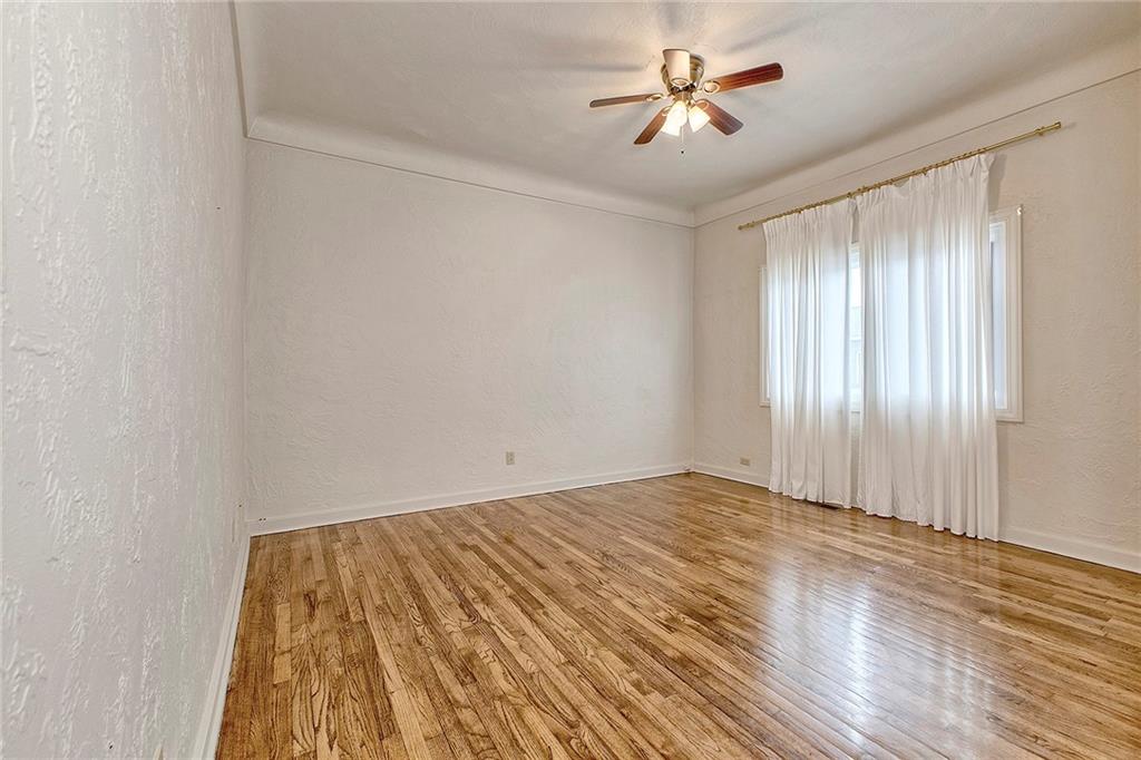 147 South Quarry Street Mount Pleasant, PA 15666 - Photo 6 of 30 a view of room with window and ceiling fan