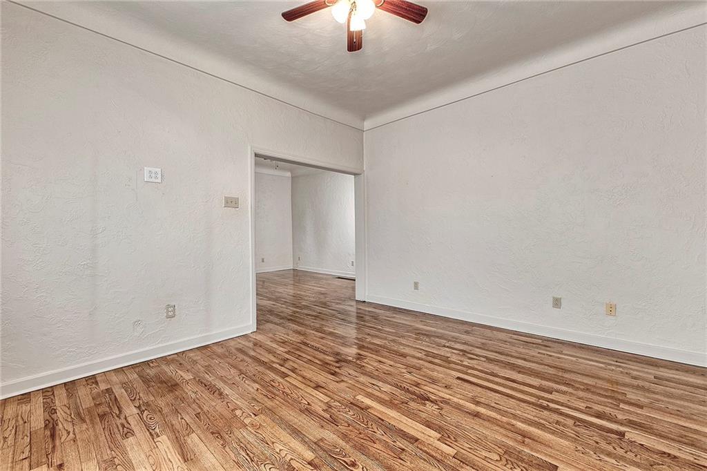 147 South Quarry Street Mount Pleasant, PA 15666 - Photo 8 of 30 wooden floor in an empty room