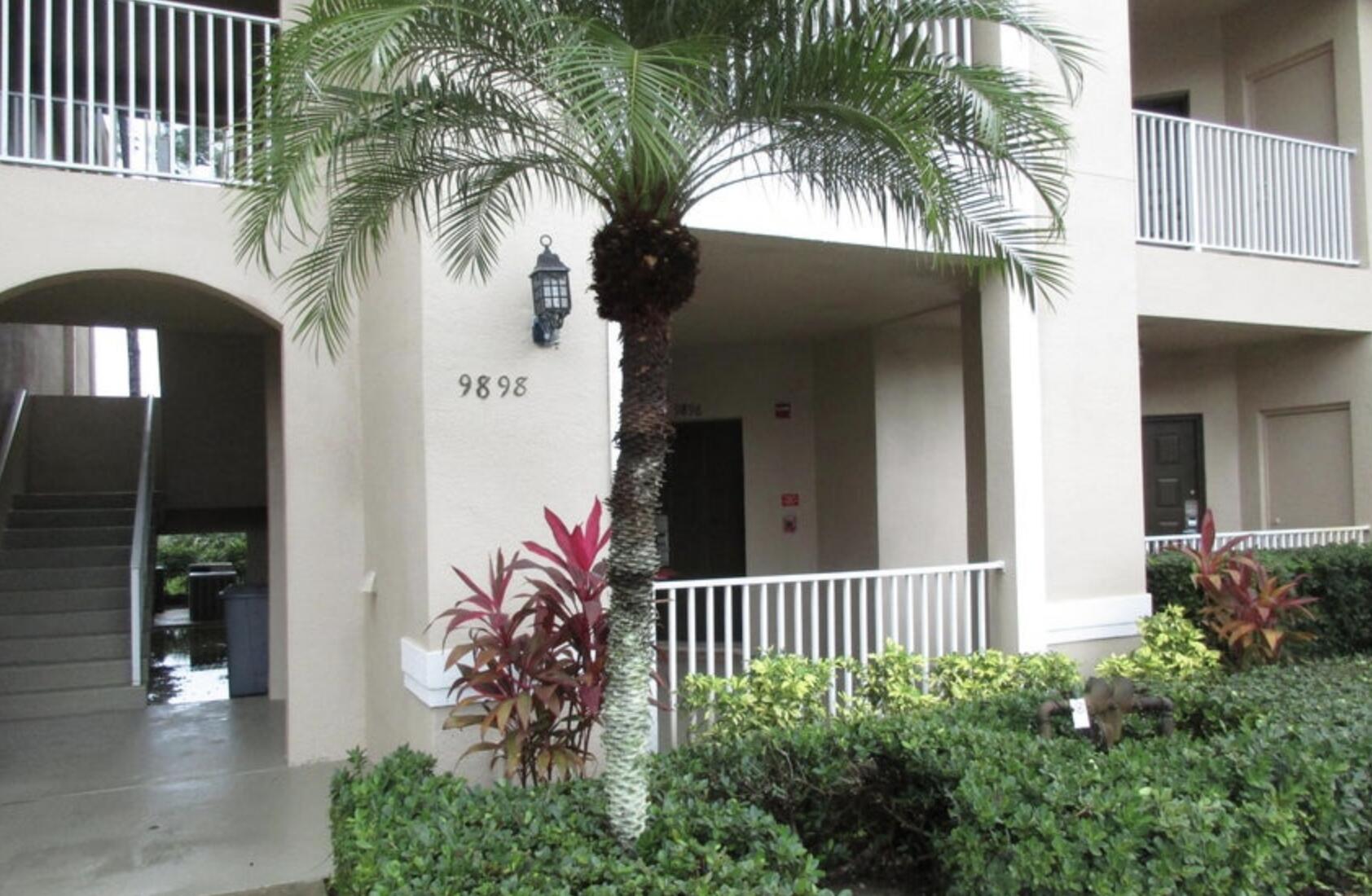 9898 Perfect Drive, Unit 19B Port St. Lucie, FL 34986 - Photo 1 of 10 front view of a house