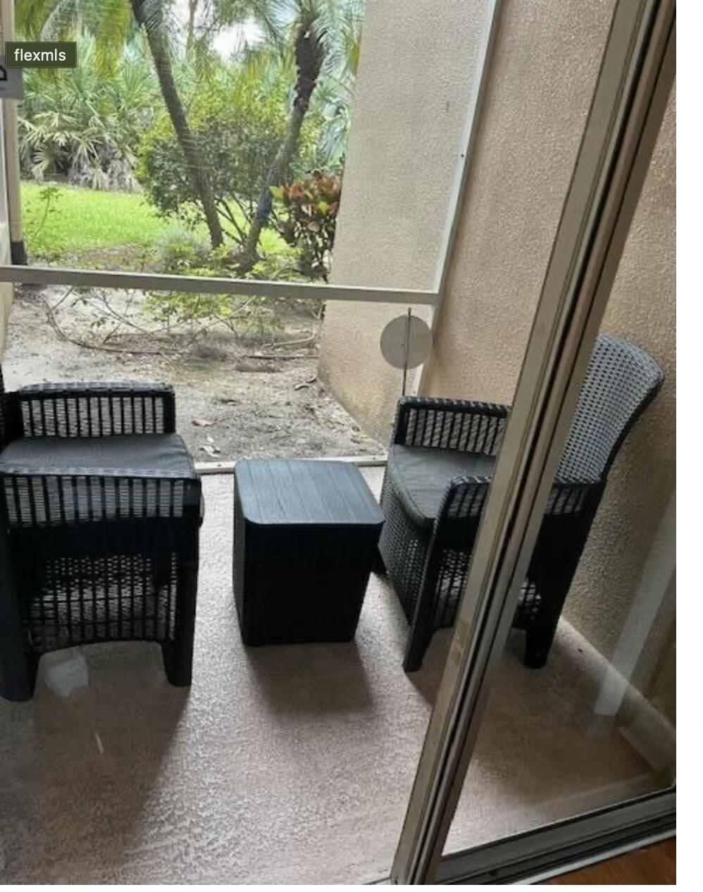 9898 Perfect Drive, Unit 19B Port St. Lucie, FL 34986 - Photo 5 of 10 a view of front door