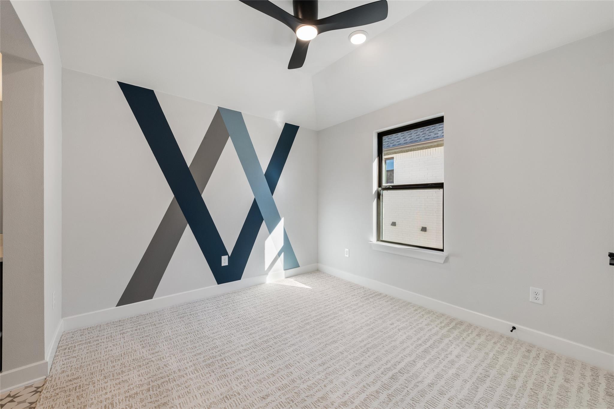 6216 Bower Well Road Austin, TX 78738 - Photo 27 of 31 an empty room with wooden floor and windows