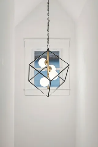 a living room with granite countertop furniture and a wooden floor