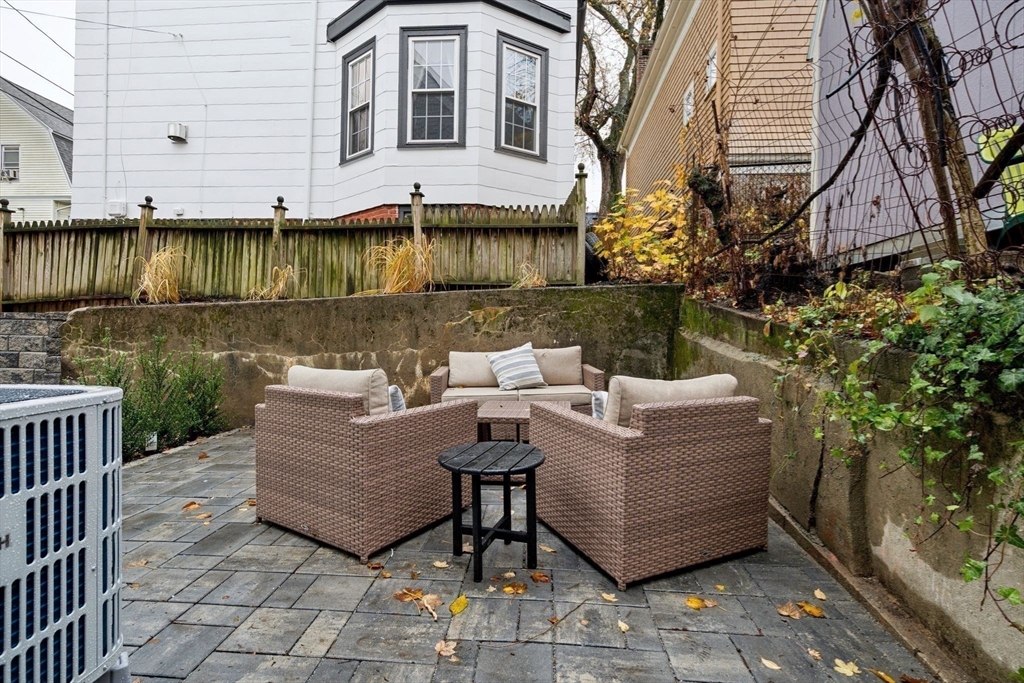 15 Spring Hill Terrace Somerville, MA 02143 - Photo 35 of 38 a view of a couches in the patio