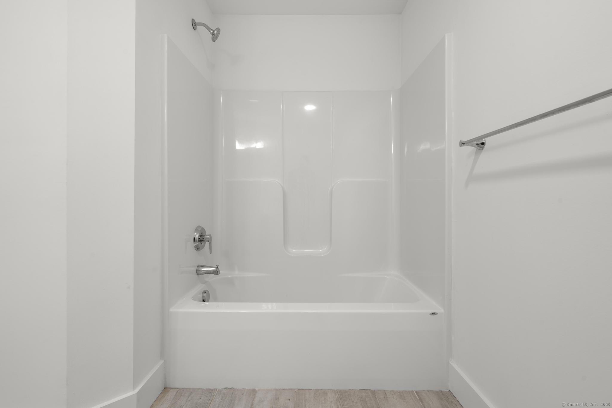 245 East Main Street, Unit 2 Branford, CT 06405 - Photo 29 of 40 a bathroom with a bathtub